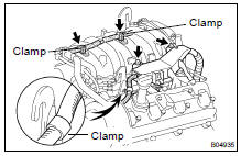 (g) Remove the 2 bolts, and disconnect the engine wire protector