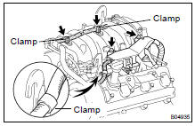 DISCONNECT ENGINE WIRE PROTECTOR FROM UPPER INTAKE MANIFOLD