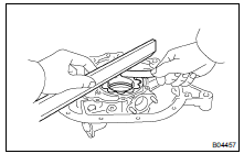  INSPECT ROTORS FOR SIDE CLEARANCE