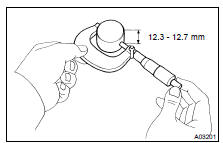 (b) Using a micrometer, measure the lifter diameter at the