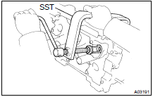 REMOVE VALVE LIFTERS AND SHIMS