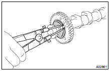 DISASSEMBLE EXHAUST CAMSHAFTS