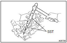 REPLACE VALVE GUIDE BUSHINGS