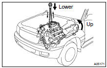 INSTALL ENGINE AND TRANSMISSION ASSEMBLY IN VEHICLE