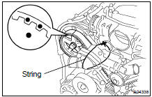  REMOVE TIMING BELT TENSIONER