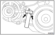  REMOVE TIMING BELT TENSIONER