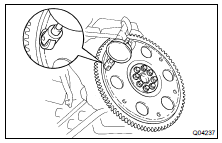 MEASURE DRIVE PLATE RUNOUT AND INSPECT RING GEAR