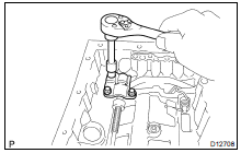 REMOVE PARKING LOCK PAWL BRACKET