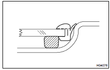 Using a knife, cut off the moulding as shown in the illustration.