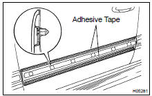 (a) Using a heat light, heat the moulding to 40 - 60 C (104