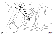 (b) Using 2 screwdrivers, remove the shift lever ring.