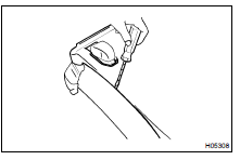 (a) Using a screwdriver, disengage the hooks as shown in the