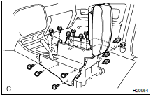 REMOVE REAR CONSOLE BOX